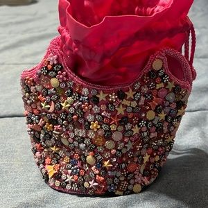 Small seashell embellished purse